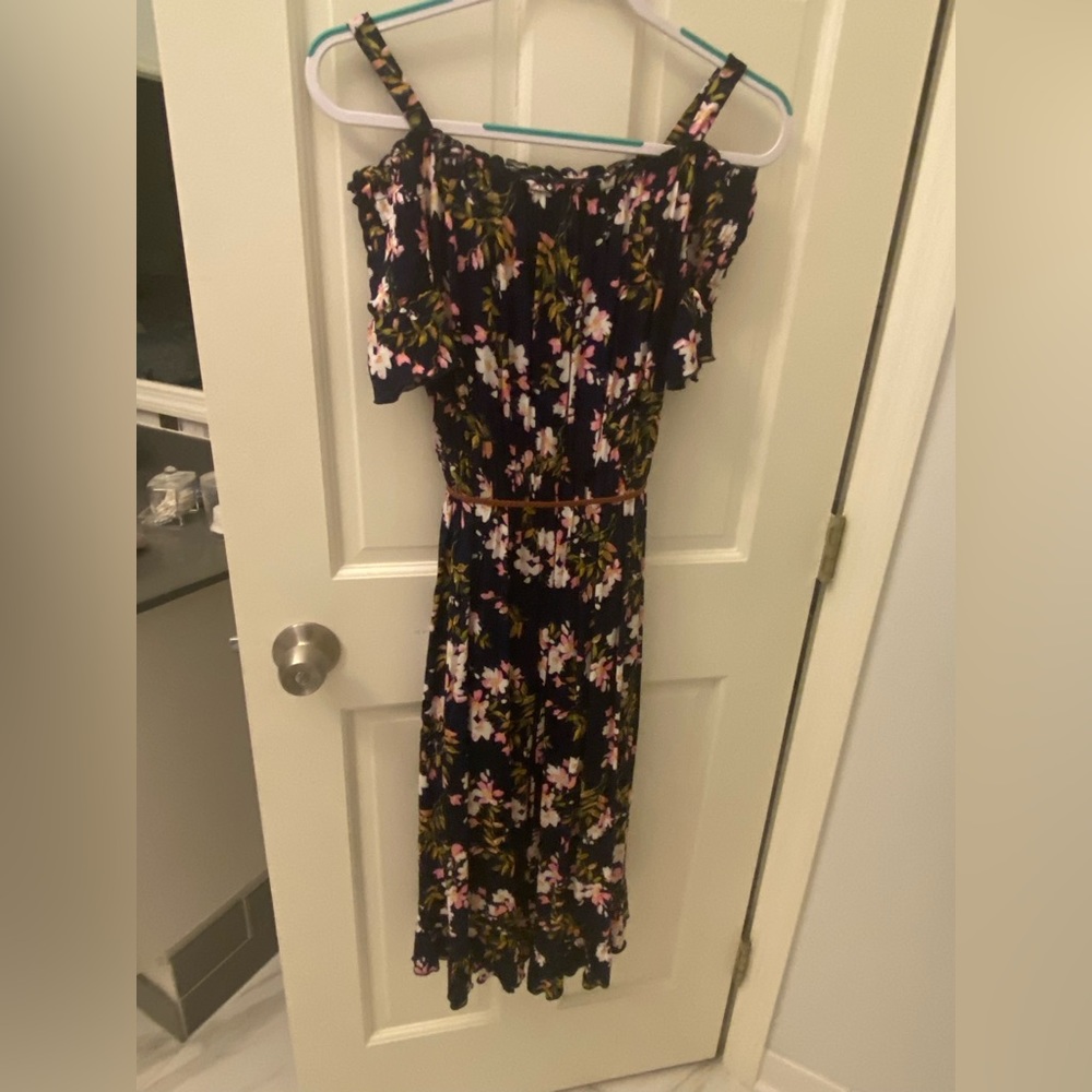 Lovely off the shoulder floral dress with brown belt.